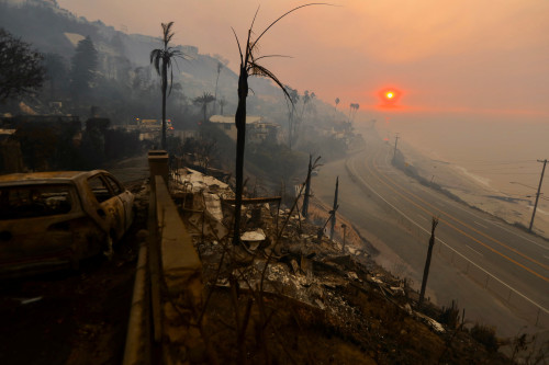 Massive Los Angeles fires rage on even as Hollywood blaze retreats