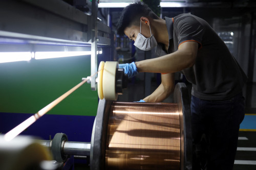 Copper climbs with tight stocks, demand in focus